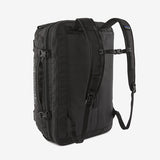 Patagonia Black Hole® MLC® 45L travel backpack shown from the back, with black durable fabric and adjustable shoulder straps.