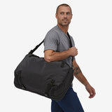 Patagonia Black Hole® MLC® 45L travel duffel bag in black with zippered compartments and durable nylon fabric.