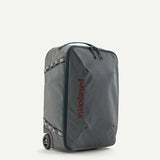Patagonia Black Hole® MLC® Wheelie luggage with black durable fabric, extended handle, and wheels for easy travel.