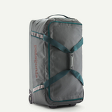 Patagonia Black Hole® Wheeled Duffel Bag 70L with black durable fabric, zipper closure, and retractable handle for travel use.
