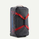 Patagonia Black Hole® Wheeled Duffel Bag 70L, black nylon travel bag with wheels and handle, suitable for long trips and durable travel.