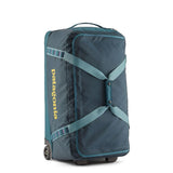 Patagonia Black Hole® Wheeled Duffel Bag 70L with black durable fabric and sturdy wheels for travel and storage.