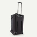 Patagonia Black Hole® Wheeled Duffel Bag 70L with black durable water-resistant fabric, large wheels, and extendable handle for travel.