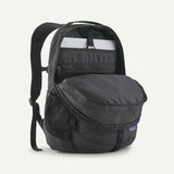 Patagonia Refugio Daypack 26L in black, showing the front view with padded shoulder straps and zippered compartments.