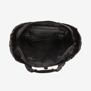 Open Patagonia Ultralight Black Hole® Tote Pack 27L showing black water-resistant nylon material and spacious interior.