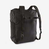 Patagonia Ultralight Black Hole® Tote Pack in black, showing the back view with adjustable straps and spacious 27L capacity