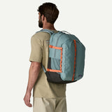 Patagonia Refugio Daypack 32L with multiple compartments, padded shoulder straps, and a durable black nylon exterior.
