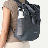Patagonia Terravia Tote Pack 24L in black, featuring a spacious eco-friendly design with shoulder straps and multiple compartments.