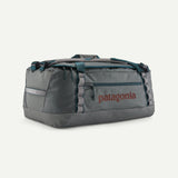 Patagonia Black Hole 55L duffel bag in gray fabric, showing the spacious main compartment and sturdy handles.