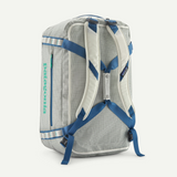 Patagonia Black Hole 55L duffel bag shown in black with adjustable shoulder strap and spacious main compartment.