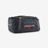 Black Patagonia Black Hole 40L duffel bag with sturdy handles and durable nylon fabric, ideal for travel and outdoor adventures.