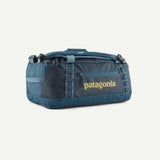 Black Patagonia Black Hole 40L duffel bag with sturdy handles and zipper closure, designed for durable travel and storage.