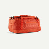 Patagonia Black Hole 40L duffel bag in black, showing its durable fabric and spacious main compartment for travel or outdoor use.