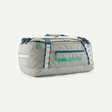 Patagonia Black Hole 40L duffel bag in black fabric with carry straps and zipper closure, designed for durable travel and storage.