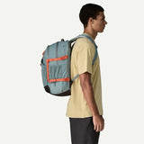 Patagonia Refugio Daypack 30L showing a black backpack with adjustable straps and multiple compartments for outdoor use.