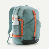 Patagonia Refugio Daypack 30L in black, featuring multiple compartments, padded shoulder straps, and a sturdy carry handle.