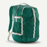 Patagonia Refugio Daypack 30L in black, showing the main compartment, padded shoulder straps, and front zipper pocket.