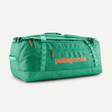 Patagonia Black Hole® 70L duffel bag in aqua, durable travel and outdoor gear with spacious main compartment and sturdy handles.