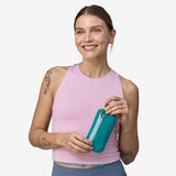 Patagonia Ultralight Black Hole Mini Hip Pack in patchwork Subtidal Blue, compact 1L waterproof pack with adjustable strap.