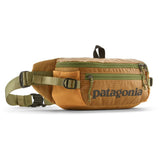 Patagonia Black Hole® Waist Pack 5L in shiny black with adjustable strap and zippered pocket, designed for outdoor activities.