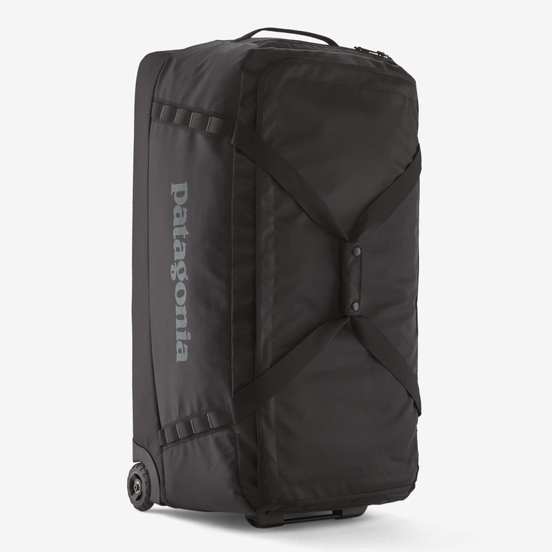 Patagonia Black Hole® Matte Wheeled Duffel 100L with sturdy wheels and black durable fabric for versatile travel storage