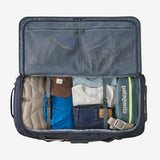 Patagonia Black Hole® Matte Wheeled Duffel 100L in black, showing durable fabric and sturdy wheels for travel convenience.