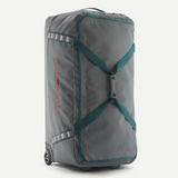 Patagonia Black Hole® Matte Wheeled Duffel 100L shown with sturdy wheels and durable matte black fabric for travel and storage.