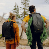 Peak Design 45L outdoor backpack in black, showing adjustable straps, multiple compartments, and durable fabric for outdoor adventures.