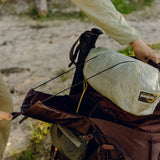 Peak Design 45L outdoor backpack in Eclipse color, showing adjustable straps, multiple compartments, and durable outdoor-ready materials.