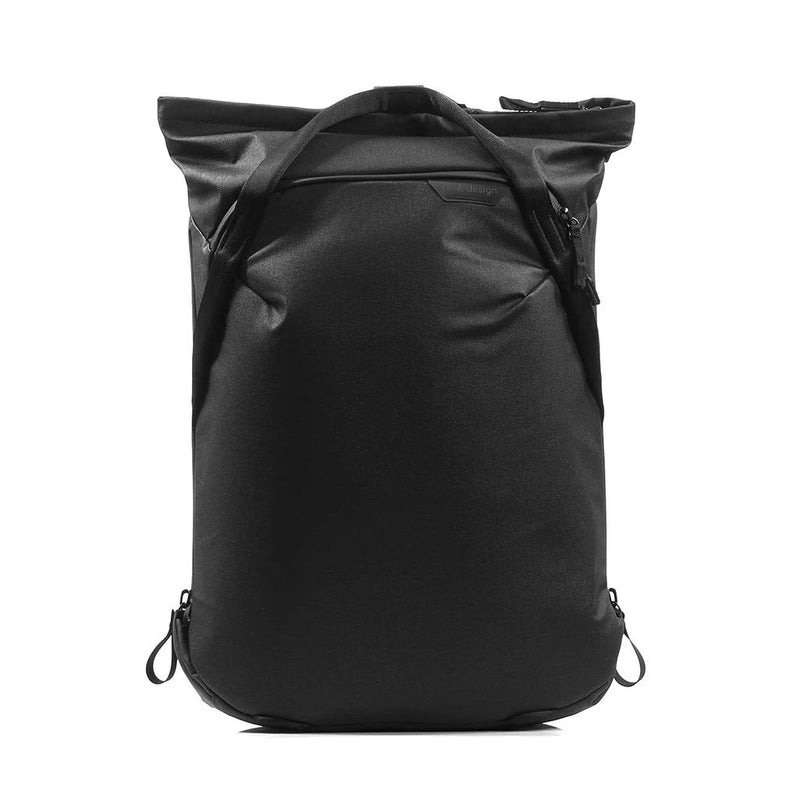 Peak Design Everyday Totepack 20L in black with adjustable shoulder straps, open main compartment, and exterior zip pockets.