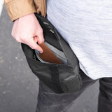 Black Peak Design Field Pouch V2 with multiple compartments and adjustable strap for versatile storage and organization.