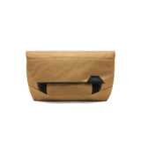 Peak Design Field Pouch V2 in Coyote with multiple compartments and adjustable strap, designed for organized carrying.
