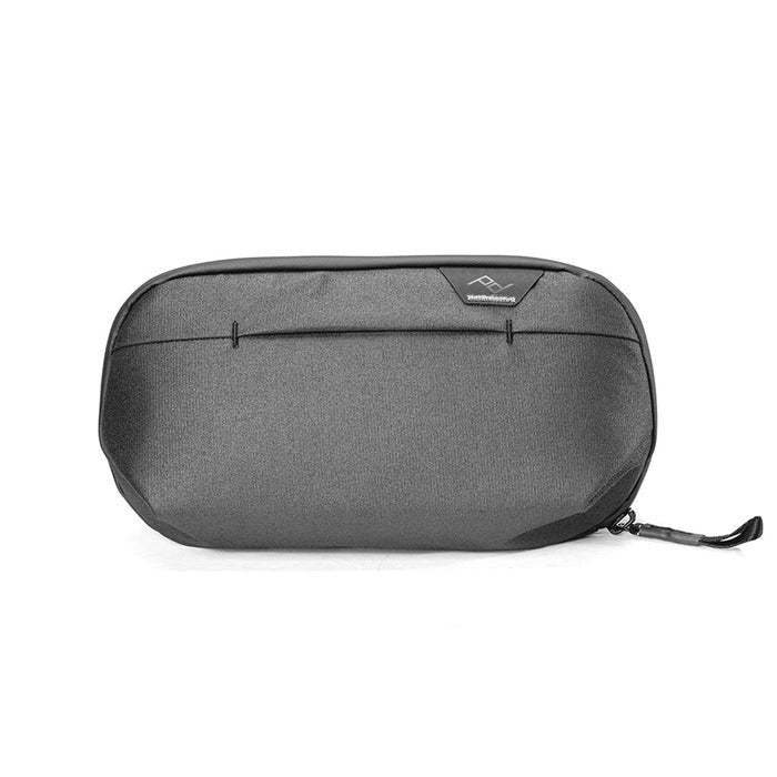 Black Peak Design small wash pouch with zippered closure and compact design for travel organization.