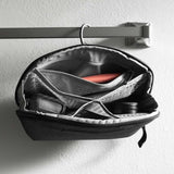 Black Peak Design small wash pouch with zipper and compact design, ideal for travel and organization.