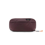 Black Peak Design small wash pouch with compact, durable design, featuring zip closure and multiple compartments for travel essentials.