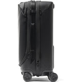 Bright sage Peak Design Roller Pro Carry-On luggage with sturdy wheels, telescoping handle, and sleek design for travel convenience.
