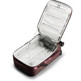 Peak Design Roller Pro Carry-On luggage in sage green with sturdy wheels and sleek design, perfect for travel.
