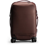 Peak Design Roller Pro Carry-On luggage in sage color, showing its sleek design and sturdy handle for travel.