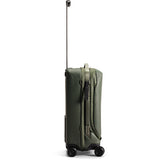 Peak Design Roller Pro Carry-On luggage in sage color, showing the sleek, compact design with handles and wheels for travel.