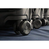 Peak Design Roller Pro Carry-On luggage in sage color, showing a sleek, durable carry-on bag with wheels and handle for travel.