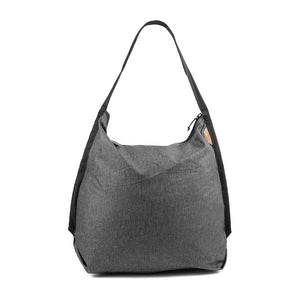 Peak Design packable tote bag shown folded and unfolded, lightweight and versatile for everyday use and travel.