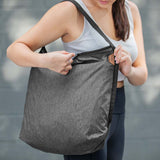 Peak Design packable tote bag folded flat, lightweight and compact for versatile carrying and storage.