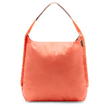 Peak Design packable tote bag open with handles visible, showing its compact and versatile design for everyday carrying.