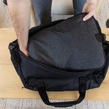 Large Peak Design packing cube with black fabric and organizational compartments, ideal for travel storage.