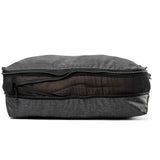 Large Peak Design packing cubes, shown in mesh with zipper closures, designed for organized travel storage.