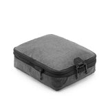 Peak Design Smedium packing cube with multiple compartments and durable fabric for organized travel storage.