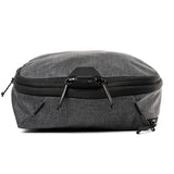 Peak Design Smedium Packing Cube showing organized interior with clothing items, durable nylon construction, and zipper closure.