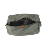 Peak Design Shoe Pouch in sage green, compact travel accessory with zip closure for organizing shoes.