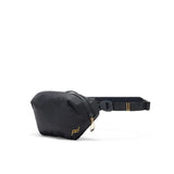 Black Peak Design Outdoor Sling 2L, a compact crossbody bag with adjustable strap and multiple compartments for outdoor essentials.