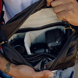 Black Peak Design Outdoor Sling 7L, a compact crossbody bag with adjustable strap and outdoor-ready design.